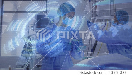 Performing emergency ventilation three healthcare professionals coordinating in ICU, with monitors Performing emergency ventilation three healthcare professionals coordinating in ICU, with monitors 135618881