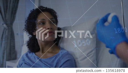 Gazing patient wearing top receiving syringe from gloved hand on hospital bed by curtained window 135618978