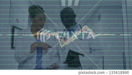 Reviewing data, doctors analyzing in hospital corridor, with tablet, stethoscopes and graph overlay Reviewing data, doctors analyzing in hospital corridor, with tablet, stethoscopes and graph overlay 135618990