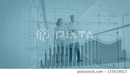 Walking lab coat doctors analyzing data in hospital corridor with tablet stethoscopes chart overlay Walking lab coat doctors analyzing data in hospital corridor with tablet stethoscopes chart overlay 135619013