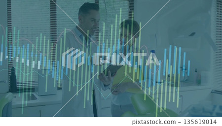 Reviewing medical professionals analyzing data in clinic room, with tablet and yellow folder Reviewing medical professionals analyzing data in clinic room, with tablet and yellow folder 135619014