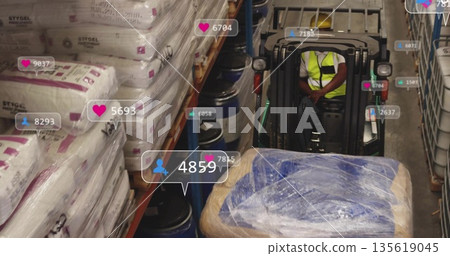Operator wearing safety vest moving pallet on forklift in warehouse, with social icons, copy space Operator wearing safety vest moving pallet on forklift in warehouse, with social icons, copy space 135619045