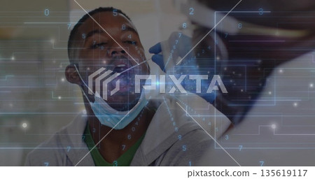 Receiving swab, patient wearing surgical mask lowered under chin hoodie in lab with digital overlay 135619117