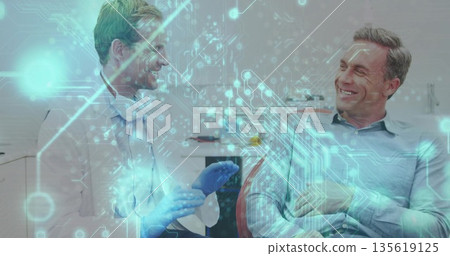 Dentist wearing lab coat and gloves consulting patient on chair in dental clinic, digital overlay Dentist wearing lab coat and gloves consulting patient on chair in dental clinic, digital overlay 135619125