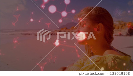 Sitting woman in top hugging knees at shore, wireless earbuds, red network overlay, copy space Sitting woman in top hugging knees at shore, wireless earbuds, red network overlay, copy space 135619198