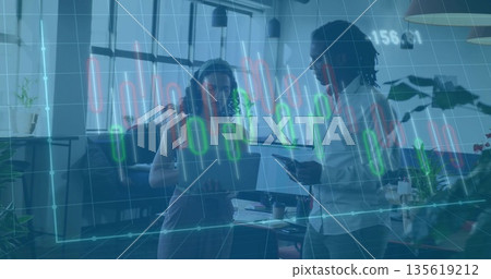 Discussing two colleagues analyzing translucent financial charts in office with laptop and tablet Discussing two colleagues analyzing translucent financial charts in office with laptop and tablet 135619212