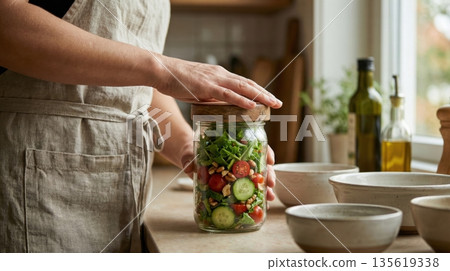 Modern Healthy Meal Prep with Glass Containers on Kitchen Table Modern Healthy Meal Prep with Glass Containers on Kitchen Table 135619338