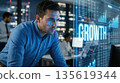 Businessman analyzing financial growth graph with holographic chart 135619344