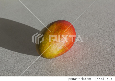 This is a red ripening apple mango. 135619393