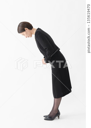 Woman in mourning clothes Funeral image Woman in mourning clothes Funeral image 135619470