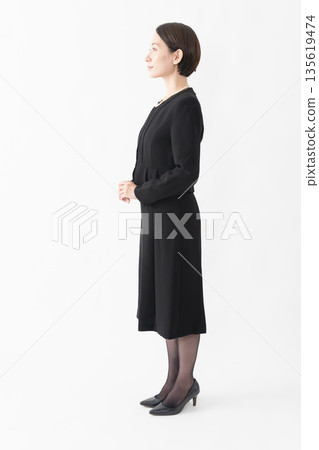Woman in mourning clothes Funeral image Woman in mourning clothes Funeral image 135619474
