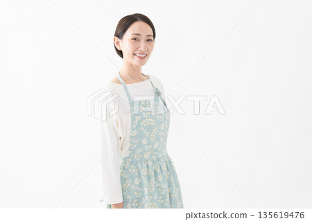Woman wearing an apron Lifestyle image 135619476