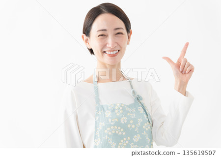 Woman wearing an apron Lifestyle image 135619507