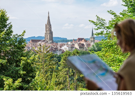 Freiburg im Breisgau Scenic View Map Reading Tourist Enjoying the Cityscape, Germany, Europe Freiburg im Breisgau Scenic View Map Reading Tourist Enjoying the Cityscape, Germany, Europe 135619563