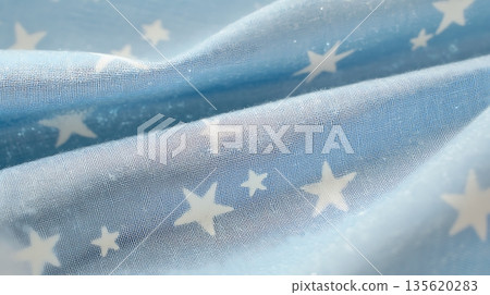 A blue fabric with stars on it 135620283