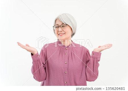 Gray-haired, silver-haired senior woman (compare, choice, option, comparison) 135620481