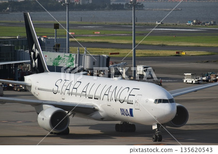 Airplane heading to the runway 135620543