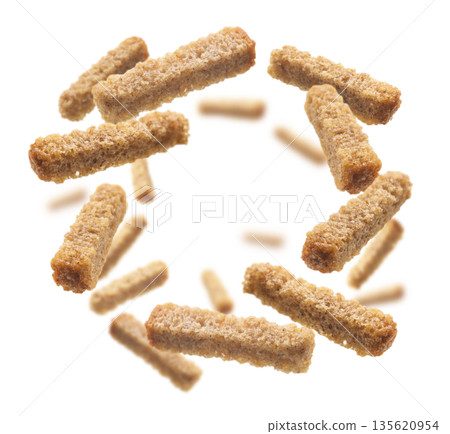 Bread croutons levitate on a white background Bread croutons levitate on a white background 135620954