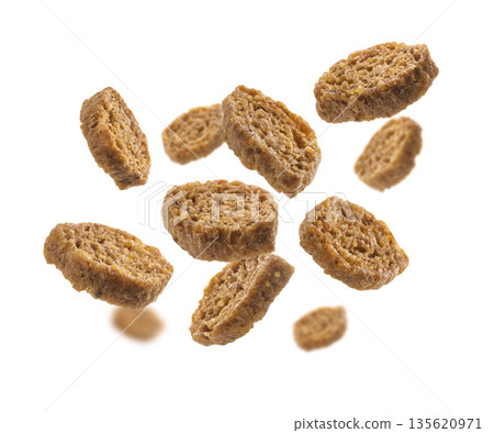 Bread croutons levitate on a white background Bread croutons levitate on a white background 135620971