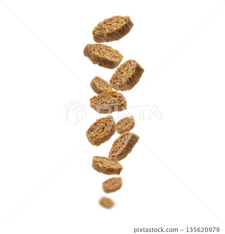 Bread croutons levitate on a white background Bread croutons levitate on a white background 135620979