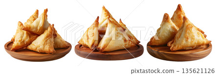 Set of Briouat triangular fruit filled pastries, phyllo pastries filled with meat or almonds on white, Arabic sweet desserts 135621126