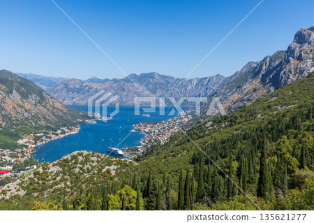 A breathtaking coastal landscape featuring a deep blue Bay of Kotor, Montenegro A breathtaking coastal landscape featuring a deep blue Bay of Kotor, Montenegro 135621277