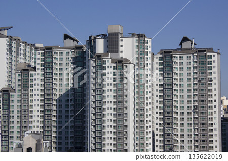 This is a cityscape of Seoul with apartments. This is a cityscape of Seoul with apartments. 135622019