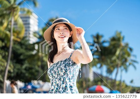 Young woman enjoying vacation. 135622779
