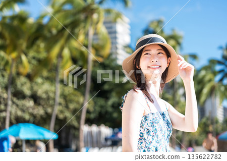 Young woman enjoying vacation. 135622782