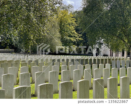 Rows of graves remembering fallen soldiers in flanders fields 135622867