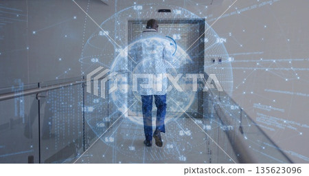 Walking male wearing white lab coat down lab corridor with holographic globe overlay and handrails Walking male wearing white lab coat down lab corridor with holographic globe overlay and handrails 135623096