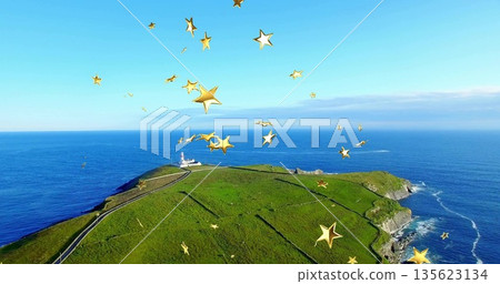 Capturing headland over blue ocean, with winding road leading to white lighthouse and golden stars Capturing headland over blue ocean, with winding road leading to white lighthouse and golden stars 135623134