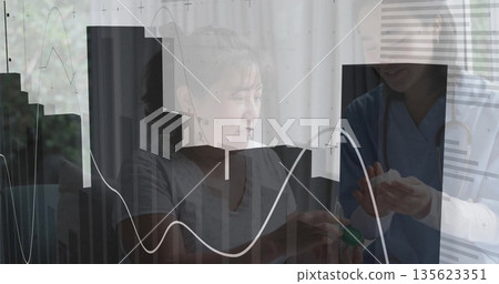 Holding green box and white pill, provider in scrubs explaining dosage at home with graph overlay Holding green box and white pill, provider in scrubs explaining dosage at home with graph overlay 135623351