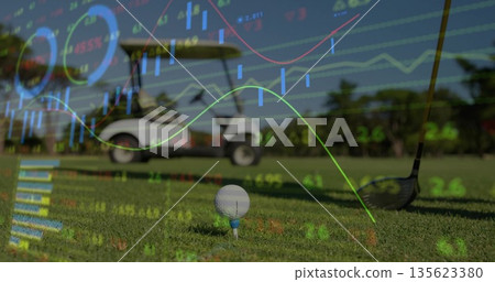 Displaying golf ball on blue tee beside driver head on fairway with golf cart, chart overlays 135623380