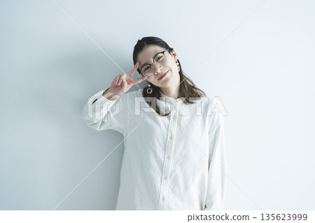Portrait of a woman with glasses Portrait of a woman with glasses 135623999