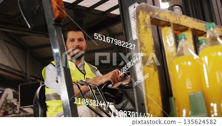 Operating forklift wearing vest lifting pallet of yellow bottles in warehouse, digital overlays Operating forklift wearing vest lifting pallet of yellow bottles in warehouse, digital overlays 135624582