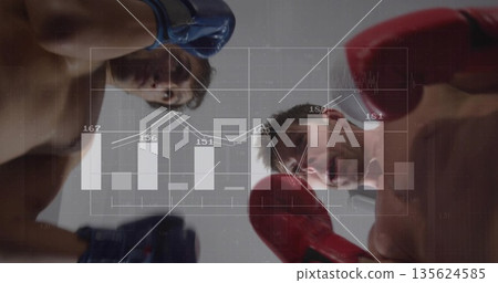 Standing boxers wearing shorts in gym raising red and blue gloves, bar and line graph overlay Standing boxers wearing shorts in gym raising red and blue gloves, bar and line graph overlay 135624585