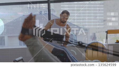 Guiding woman in leggings pushing leg press machine in studio by windows, with metric overlays 135624599