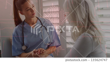 Holding patient hands, female nurse offering support at clinic, with stethoscope and blinds 135624747