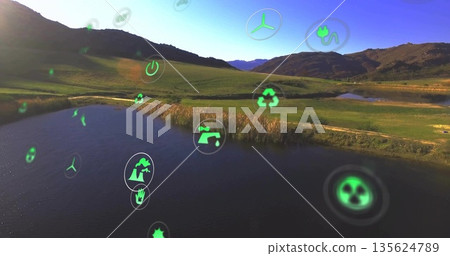 Floating green eco tech icons drifting over rural pond and grassy hills, showing energy symbols Floating green eco tech icons drifting over rural pond and grassy hills, showing energy symbols 135624789