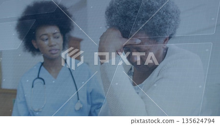Observing nurse in scrubs examining senior rubbing forehead in room, with stethoscope, copy space Observing nurse in scrubs examining senior rubbing forehead in room, with stethoscope, copy space 135624794