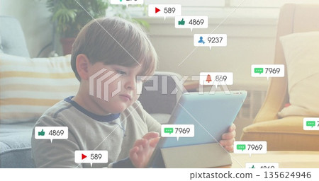 Scrolling on tablet, brown-haired child sitting on sofa in living room, with notification overlays Scrolling on tablet, brown-haired child sitting on sofa in living room, with notification overlays 135624946