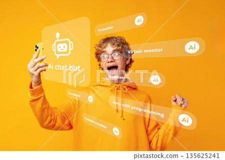 Young person uses smartphone to interact with AI chat bot in bright room 135625241