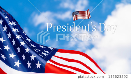Celebration of Presidents Day with an American flag waving under the blue sky 135625292