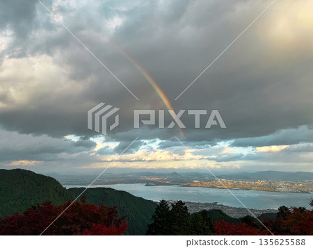 Viewing a rainbow over Lake Biwa from Mount Hiei Viewing a rainbow over Lake Biwa from Mount Hiei 135625588