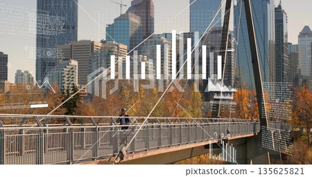 Riding male cyclist with helmet and bicycle crossing cabled footbridge at park, with data overlays Riding male cyclist with helmet and bicycle crossing cabled footbridge at park, with data overlays 135625821