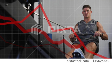 Man pulling handlebar on rowing machine inside gym, with red trend line grid overlay, copy space Man pulling handlebar on rowing machine inside gym, with red trend line grid overlay, copy space 135625840