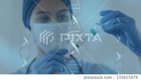 Lab tech wearing mask gloves drawing liquid from vial preparing syringe in lab, with DNA graphics Lab tech wearing mask gloves drawing liquid from vial preparing syringe in lab, with DNA graphics 135625879