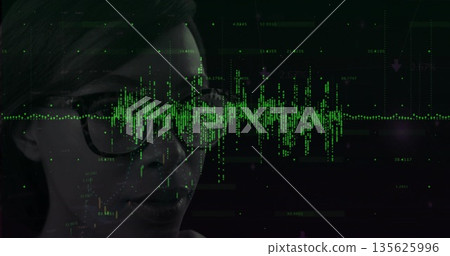Woman wearing glasses analyzing data in command center with green waveform overlay, copy space 135625996