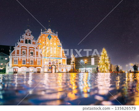 Riga, Latvia. Town Hall Square, Popular Place With Famous Landmarks On It In Night Illumination In Winter Twilight. Winter New Year Christmas Holiday Season Riga, Latvia. Town Hall Square, Popular Place With Famous Landmarks On It In Night Illumination In Winter Twilight. Winter New Year Christmas Holiday Season 135626579